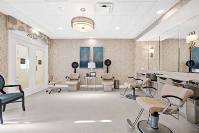 Interior view of a hair salon with styling chairs