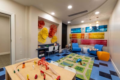 Bright and colorful playroom area with toys