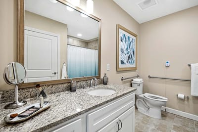 Brightly lit bathroom with modern amenities