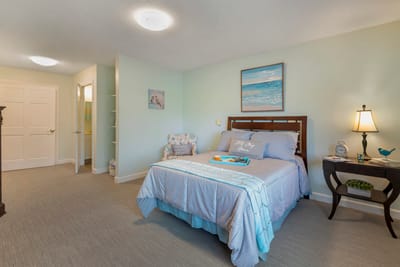 Cozy private bedroom setup with beach decor