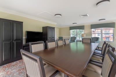 Common area with a large table and seating