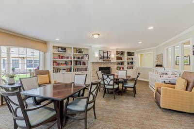 Common area with seating and bookshelves