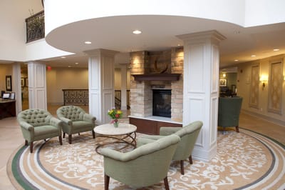Cozy common area with seating and fireplace