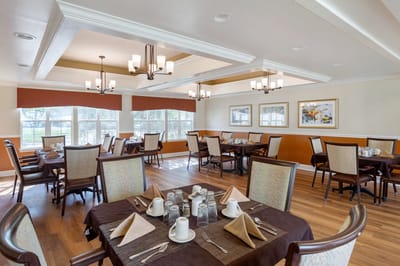 Dining area with tables set for meals