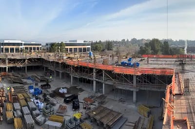 Construction site of a facility with workers on-site