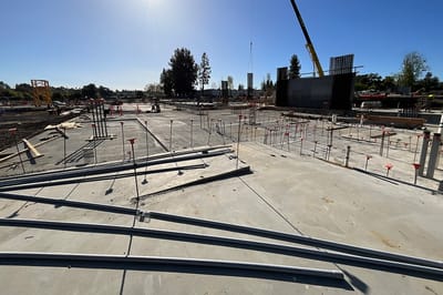 Construction site with metal beams and supports