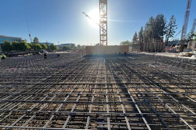 Construction site with workers and equipment