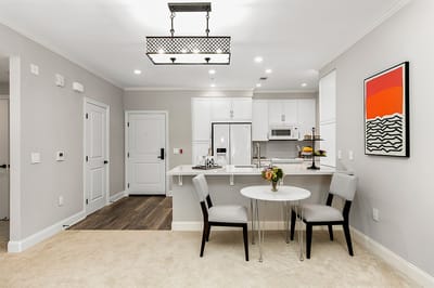 Bright and modern living area with dining table