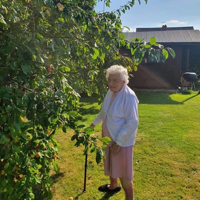 Resident enjoying time in the garden