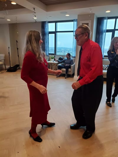 Residents dancing in a common area