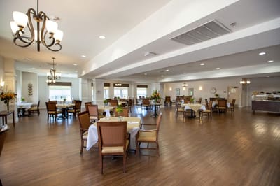 Interior dining area with tables and chairs