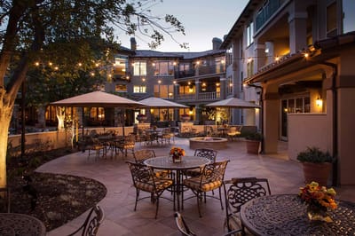 Elegant outdoor seating area with string lights