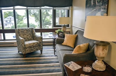 Cozy common area with a couch and armchair