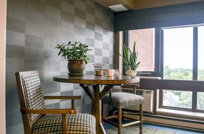 Cozy corner in a resident room with plants and seating