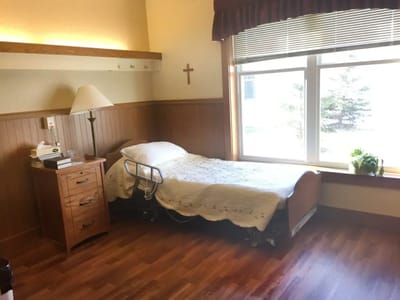Cozy private room with a bed and window