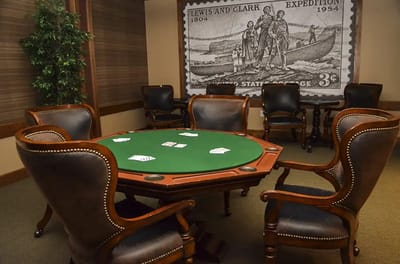 Card table set up for a game in a common area