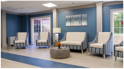 Bright lounge area with modern seating and decor