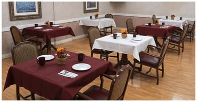 Dining area with tables set for a meal