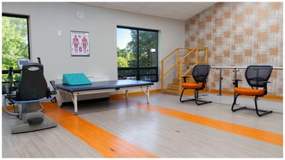 Well-equipped therapy room with therapy equipment