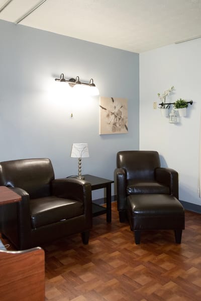 Cozy seating area in a nursing home room