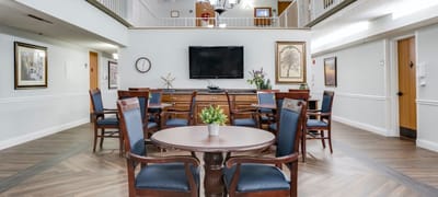 Common area with seating and a television