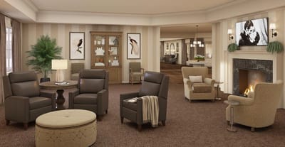 Comfortable common area with seating and a fireplace