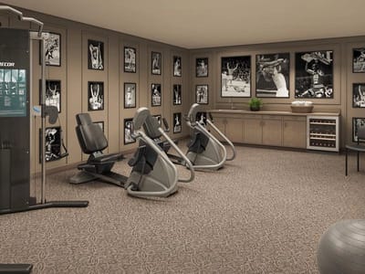 Fitness area with exercise equipment and sports decor