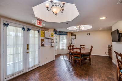 Bright interior common area with tables and chairs