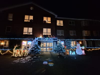 Festive outdoor decorations at the facility's entrance.