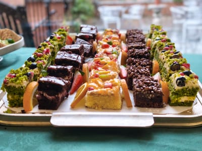 A display of assorted colorful desserts.