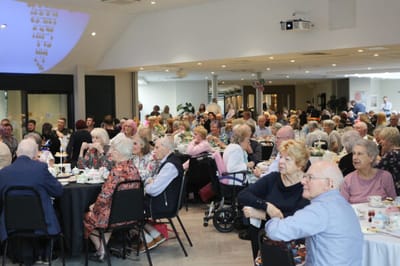 Residents enjoying a communal meal event