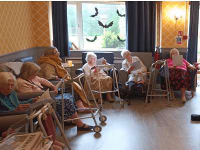 Residents enjoying time together in a common area.