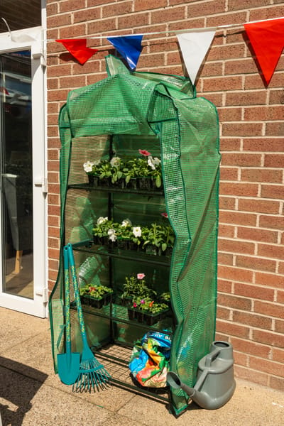 Gardening area with flower pots and tools