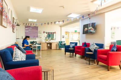 Common area with colorful seating and decorations
