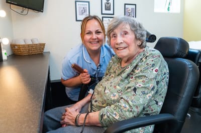 Senior resident enjoying time at the beauty salon.