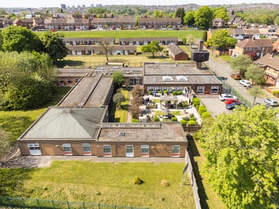 Aerial view of the assisted living facility and gardens.