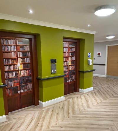 Interior corridor with book-themed doors