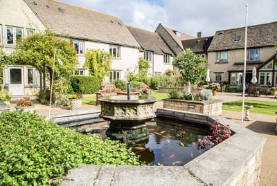 Beautiful garden area with fountain and seating