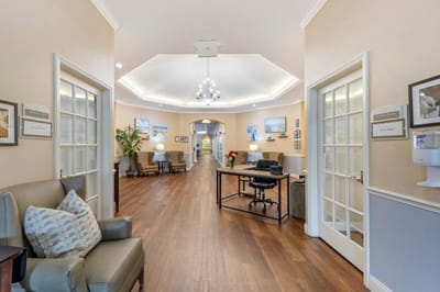 Interior hallway with seating and decor.