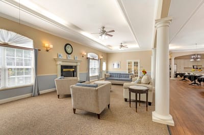 Cozy common area with seating and natural lighting.