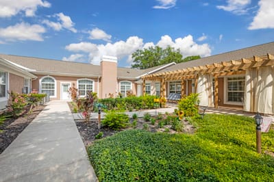 Beautiful outdoor courtyard with gardens and seating.