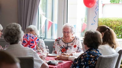 Residents enjoying a celebratory dining event