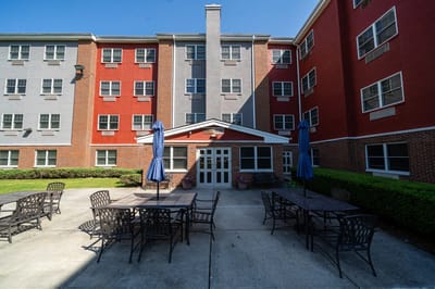 Outdoor seating area in front of the facility