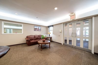 Cozy lounge area with seating and decor