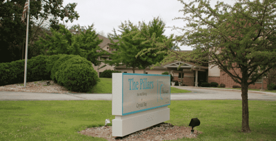 Exterior view of the facility with signage