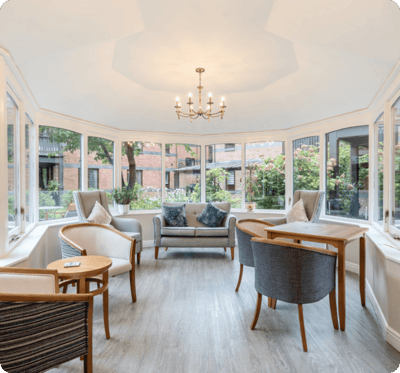 Bright common area with seating and natural light