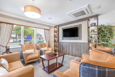 Cozy common area with comfortable seating and natural light