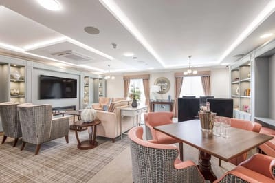 Bright common area with comfortable seating and decor