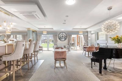 Elegant common area with seating and piano