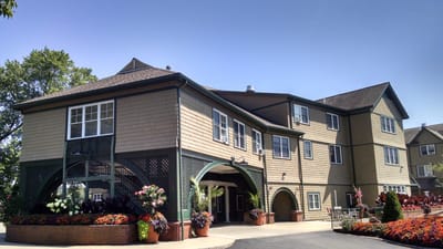 Exterior view of Bertram House with gardens